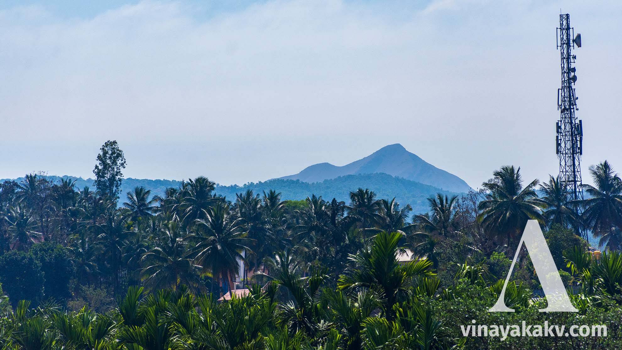 A mountain peak at a tail of the _Chandradrona_ range, as seen from _Balehonnur_.